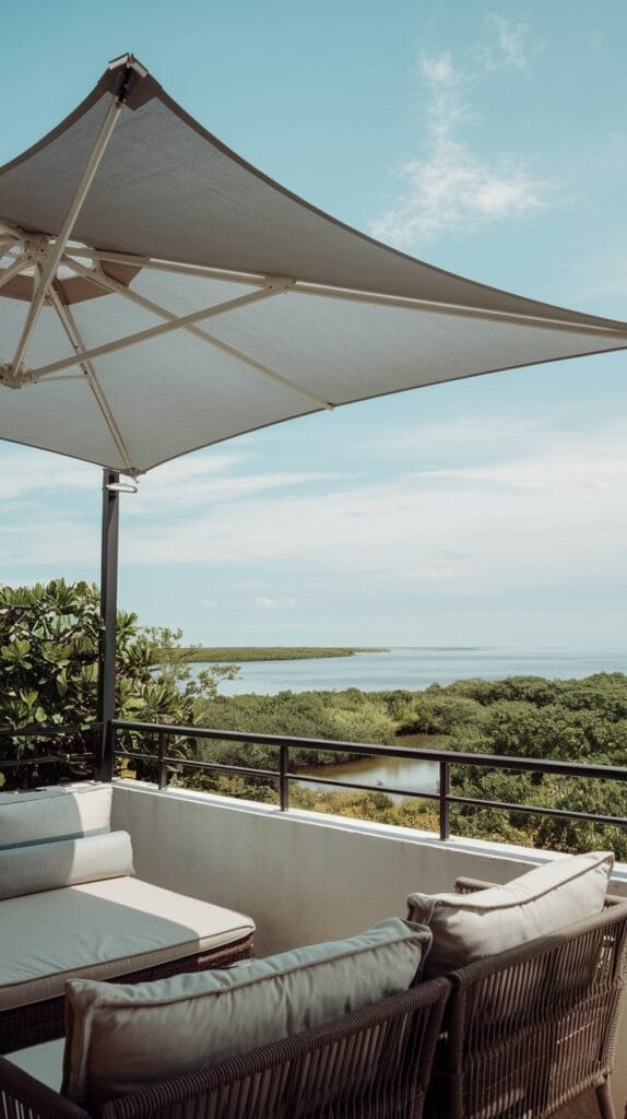 Retractable shade or umbrella on a small balcony.